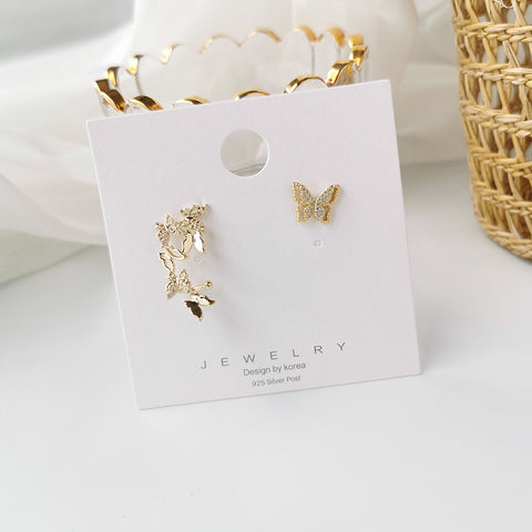 butterfly asymmetric earrings